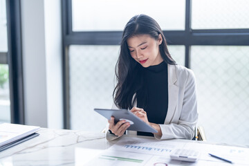 Business woman hand presses on screen digital tablet Online Digital marketing  technology