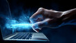 © Dream Clicks - person typing on laptop, electric beam  finger to laptop, Fast data transfer
