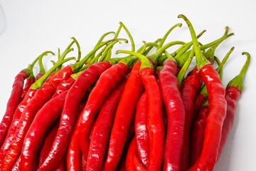 Wall Mural - Red Chili Curly is one of the most widely grown and sold red chili varieties in Indonesia. Ingredient, including making chili sauce. Chili peppers (also chile, chile pepper, chilli pepper, or chilli).