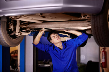 Poster - Car, inspection or repair with a mechanic man in a garage for a report on a vehicle service for insurance. Maintenance, professional and a young professional engineer in a workshop for assessment