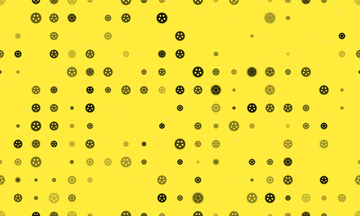Poster - Seamless background pattern of evenly spaced black car wheel symbols of different sizes and opacity. Vector illustration on yellow background with stars