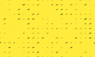 Poster - Seamless background pattern of evenly spaced black handcuffs symbols of different sizes and opacity. Vector illustration on yellow background with stars