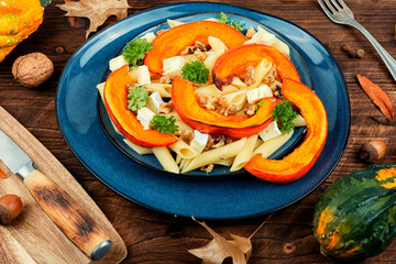Wall Mural - Delicious pumpkin pasta with nuts
