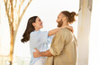 © Prostock-studio - Happy millennial european guy in casual meets lady, hugs at station or airport