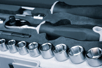 Poster - Hardware toolkit with many different garage equipment. Automobile fix background. Screwdriver metal bits set