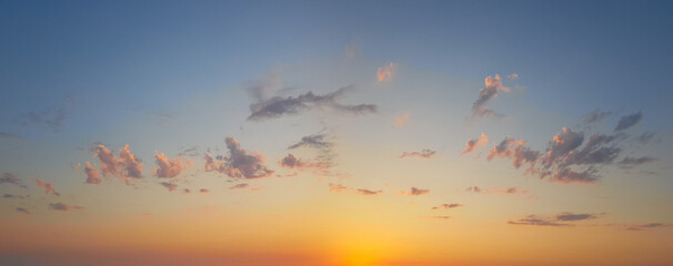 Wall Mural - idyllic atmosphere sunset sky horizon landscape. panoramic golden sky with cloud and sunlight
