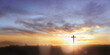 © paul - Christian wooden cross on sunset background