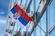 Sebian National Flag waving in the wind on pole