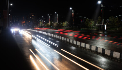 Wall Mural - car traffic at night along the avenue
