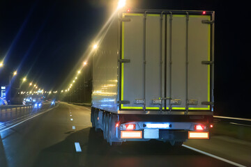 Wall Mural - truck moving at night along a country highway