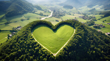 Heart Symbol Created On The Top Of A Mountain With Many Trees In A Very Green Forest
