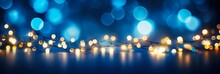 Out Of Focus Christmas Lights. Holiday Illumination And Decoration Concept - Glowing Christmas Garland Bokeh Lights In Dark Blue
