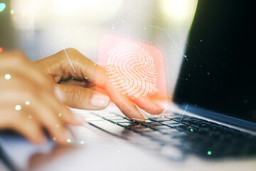 Aufkleber - Double exposure of abstract creative fingerprint hologram with hands typing on laptop on background, research and development concept