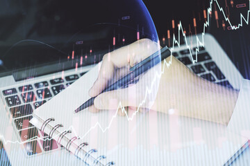 Aufkleber - Multi exposure of abstract creative financial graph with world map and with hand writing in notebook on background with laptop, forex and investment concept