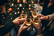 © colnihko - Happy multiracial friends toasting sparkling wine glasses close-up against golden bokeh lights background. Christmas celebration