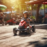 Fototapeta  - Cute little boy driving a toy car on a playground in summer