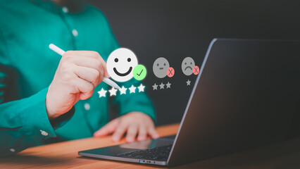 Fototapete - Customer use laptop with virtual screen on happy smile face icon for assessment feedback review satisfaction opinion and testimonial. Customer service experience and business satisfaction survey.
