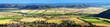 © THP Creative - Aerial panorama of Australian rural farmland with a small town and mountains in New South Wales