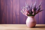 Fototapeta Lawenda - Bouquet of lavender in a vase on a wooden table. Lilac background. Generated by artificial intelligence