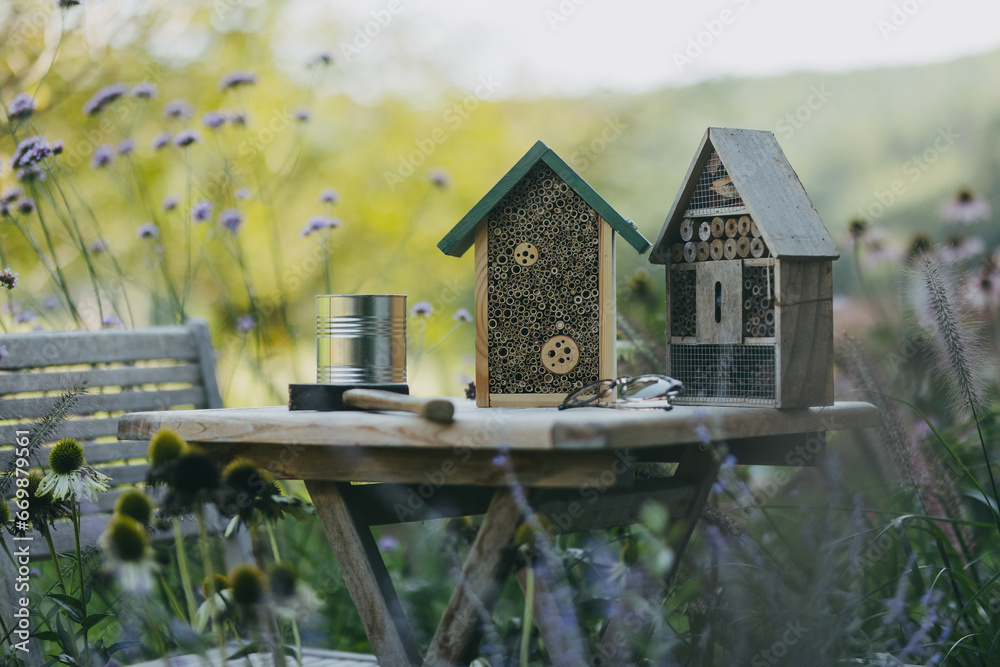 Outdoor Insect Home Wooden insect house outdoors in the garden. Bug hotel as home for ...