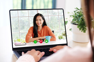 Wall Mural - Video conference, Work from home, Asian woman making video call to business team with virtual web, Coworker talking on web, Online consultation business