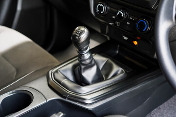 automatic transmission shift selector in the car interior. Closeup a manual shift of modern car gear shifter. 4x4 gear shift