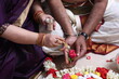 hands performing Pooja as per Hindu tradition