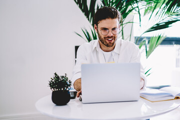 Poster - prosperous young man checking news on exchange website