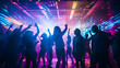 Silhouette image of people in ultraviolet light dance in disco night club to music from DJ on stage . New year night party and nightlife concept .