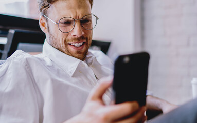 Poster - millennial man installing modern app on cellular phone