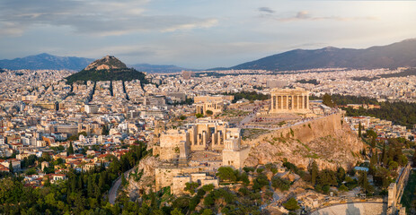 Wall Mural - Aerial close up view of the Acropolis of Athens, Greece, with Parliament Building and Lycabettus hill during sunset time