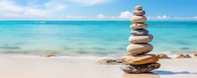 Tower Of Zen Stones On Paradise Beach Balance Concept