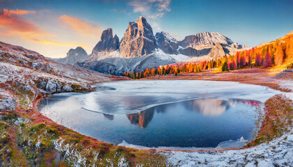 Wall Mural - wonderful morning view of frozen limides lake spectacular autumn landscape of dolomite alps superb outdoor scene of falzarego pass italy europe beauty of nature concept background