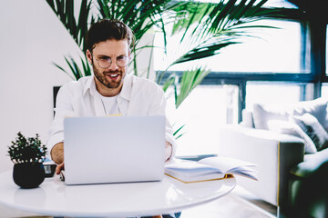 Poster - prosperous young man checking news on exchange website
