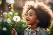 Happy little african american girl blowing a flower in outside, Cheerful child having fun playing and blowing a dandelion into the air in a park, Kid having fun with joy playing with a plant outdoors