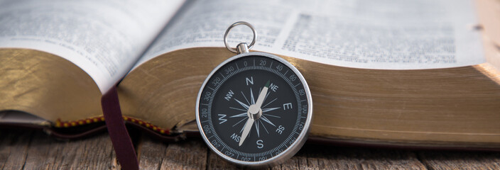 Poster - compass with the Holy Bible