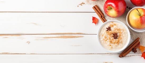 Poster - Overnight oats with red apples pecan nuts and caramel sauce served on a white wooden background