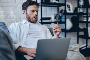 Poster - surprised hipster guy amazed from reading name on business card