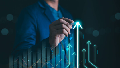 Wall Mural - Financial business growth concept. Businessperson calculate income and profit on investments and an increase in the indicators of positive growth, interest rate and dividend concept with chart graph.