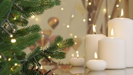 Wall Mural - Winter holidays concept close-up burning candles. Decorated Christmas tree on background. Evergreen tree bokeh flickering light bulbs garlands. Celebrating Happy New Year home. Winter family holiday