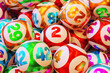 © Olga - A heap lottery balls with numbers. 3d rendering