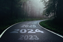 2024 New Year Road Trip Travel And Future Vision Concept . Nature Landscape With Highway Road Leading Forward To Happy New Year Celebration In The Beginning Of 2024 For Fresh And Successful Start .