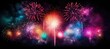 © masyastadnikova - Multicolored fireworks on a dark background. Banner for the site. Place for text. Wallpaper for holidays. Festive light