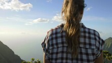 Medium Shot Behind Woman Staring At Beautiful Hawaiian Valley