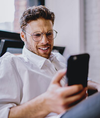 Poster - millennial man installing modern app on cellular phone