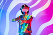 © ADDICTIVE STOCK - Latin man in tie-dye explores virtual reality with headset