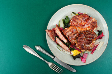 Canvas Print - Grilled steak with green salad, space for text.