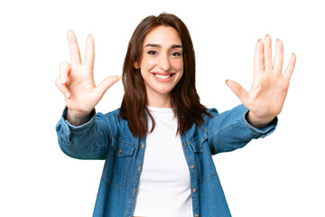 Wall Mural - Young caucasian woman over isolated chroma key background counting eight with fingers