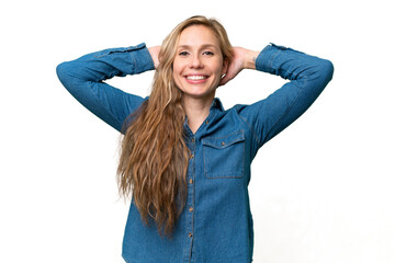 Wall Mural - Young blonde woman over isolated background laughing