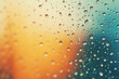 Raindrops on glass with blurred background. Abstract texture with drops on window